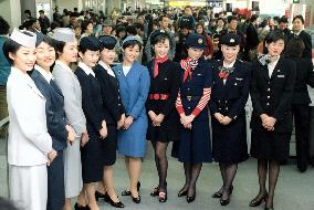 JAL parades air hostess uniforms